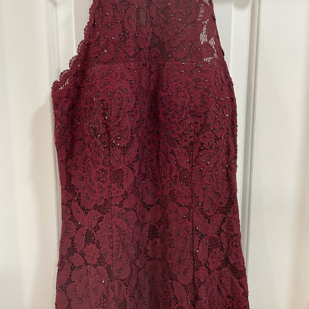 Betsy & Adam evening dress in the color burgundy, size 8, new without tags